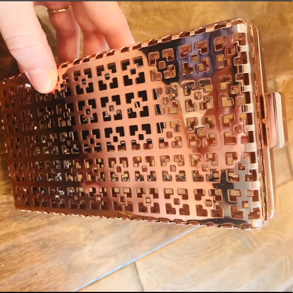 NWT Rose gold metal clutch